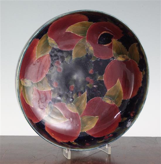 A Moorcroft pomegranate fruit bowl, c.1918, 26.5cm